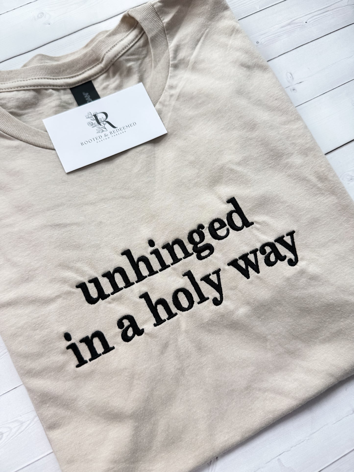 "unhinged in a holy way" Embroidered T Shirt