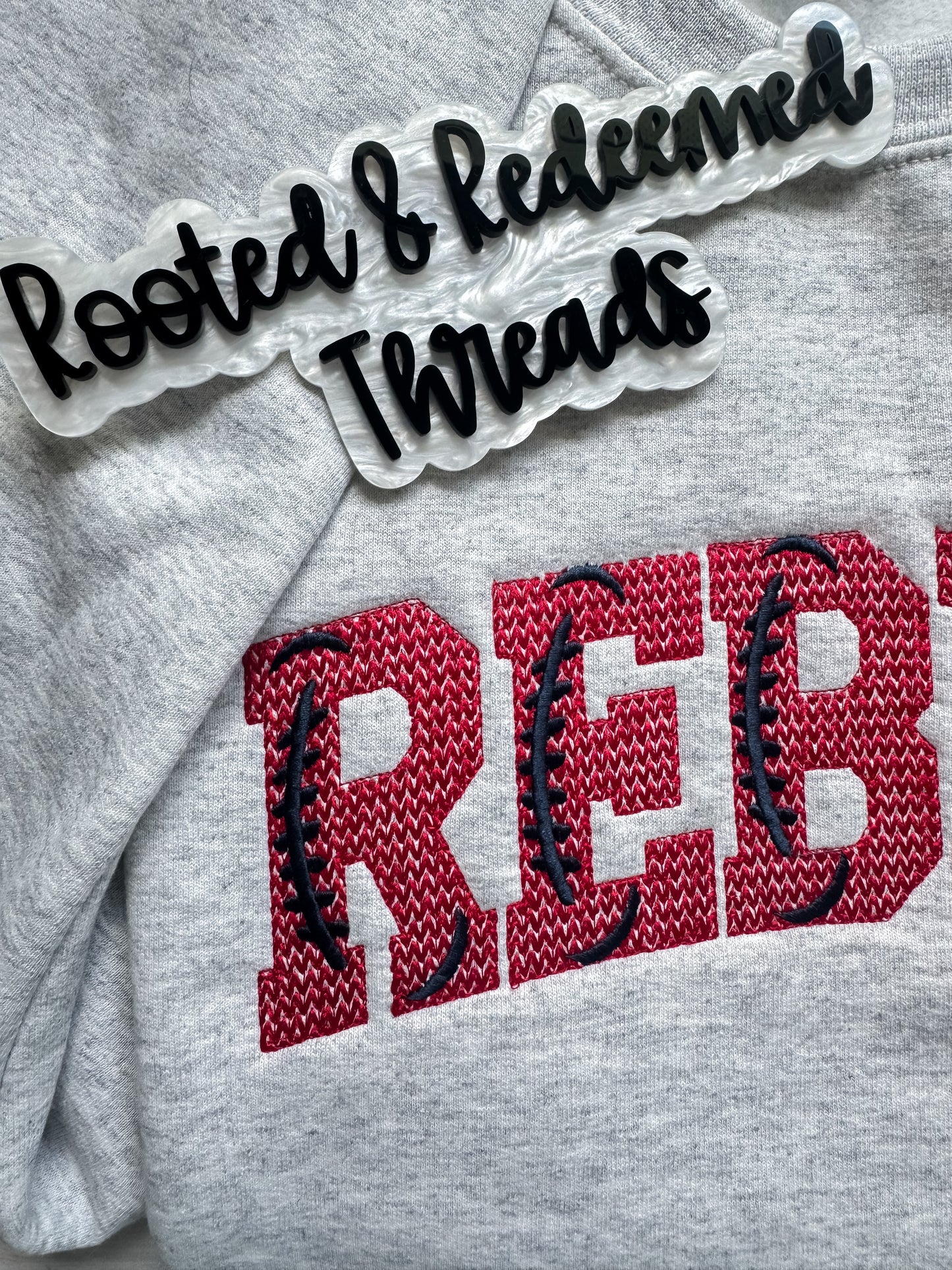 Rebels Knit Stitch Football Embroidered Sweatshirt