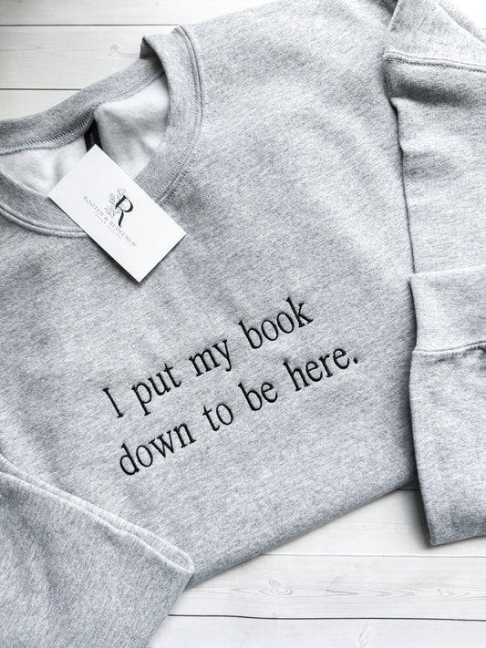 "I put my book down to be here" Embroidered Sweatshirt